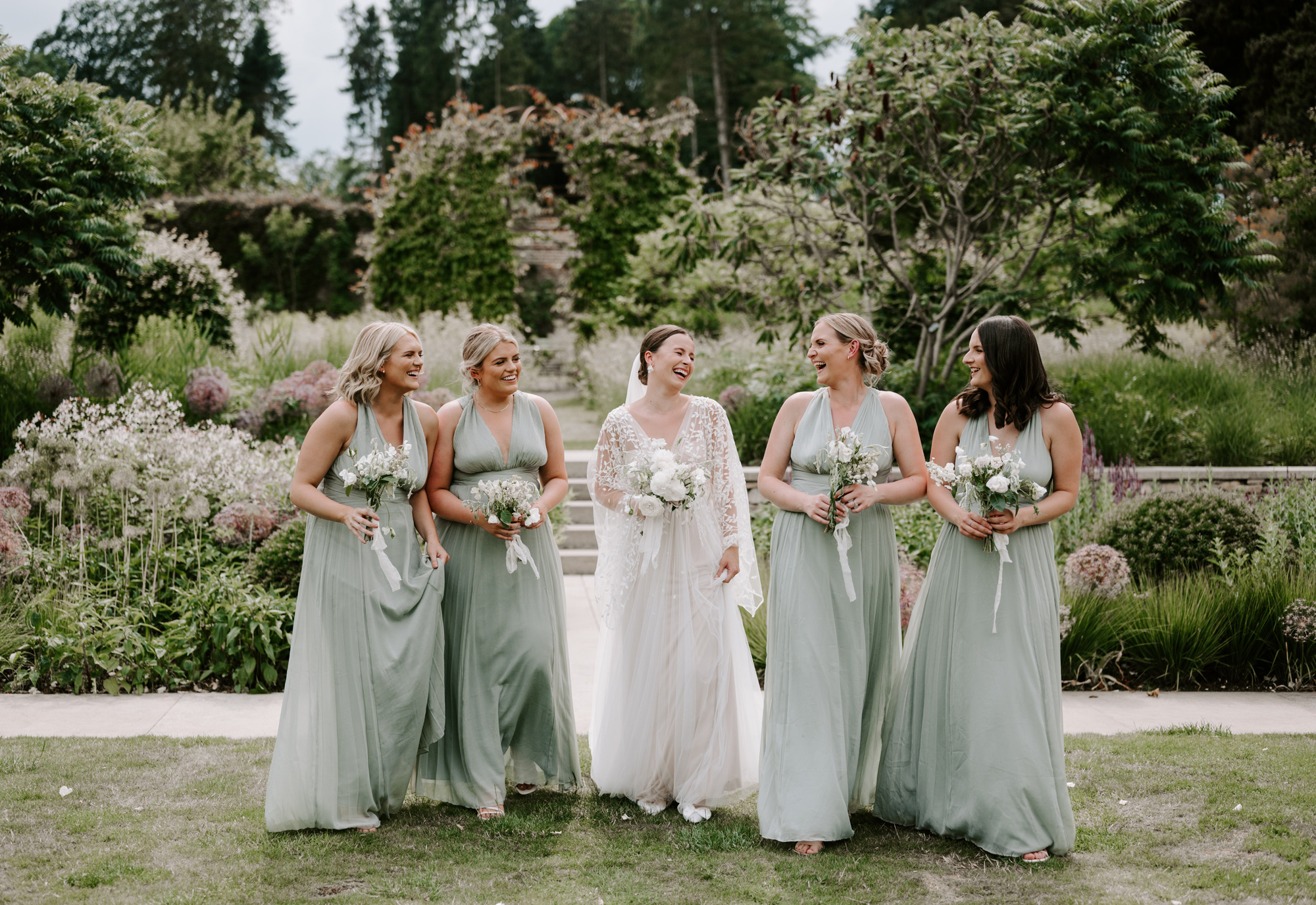 Middleton Lodge bride and bridesmaids in pale green. Moonwind wedding flowers